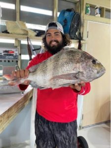 Port Aransas Fishing—Fernando holding his fish.