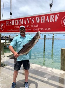 Daddy-daughter Port Aransas fishing lingcod catch — Fisherman's Wharf